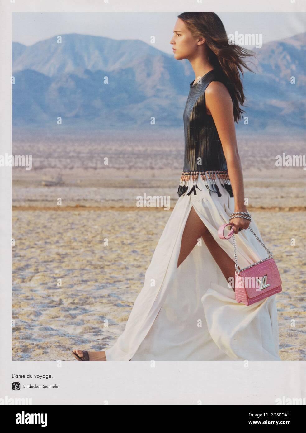 poster advertising Louis Vuitton with Liya Kebede in paper magazine from  2014 year, advertisement, creative LV Louis Vuitton 2010s advert Stock  Photo - Alamy