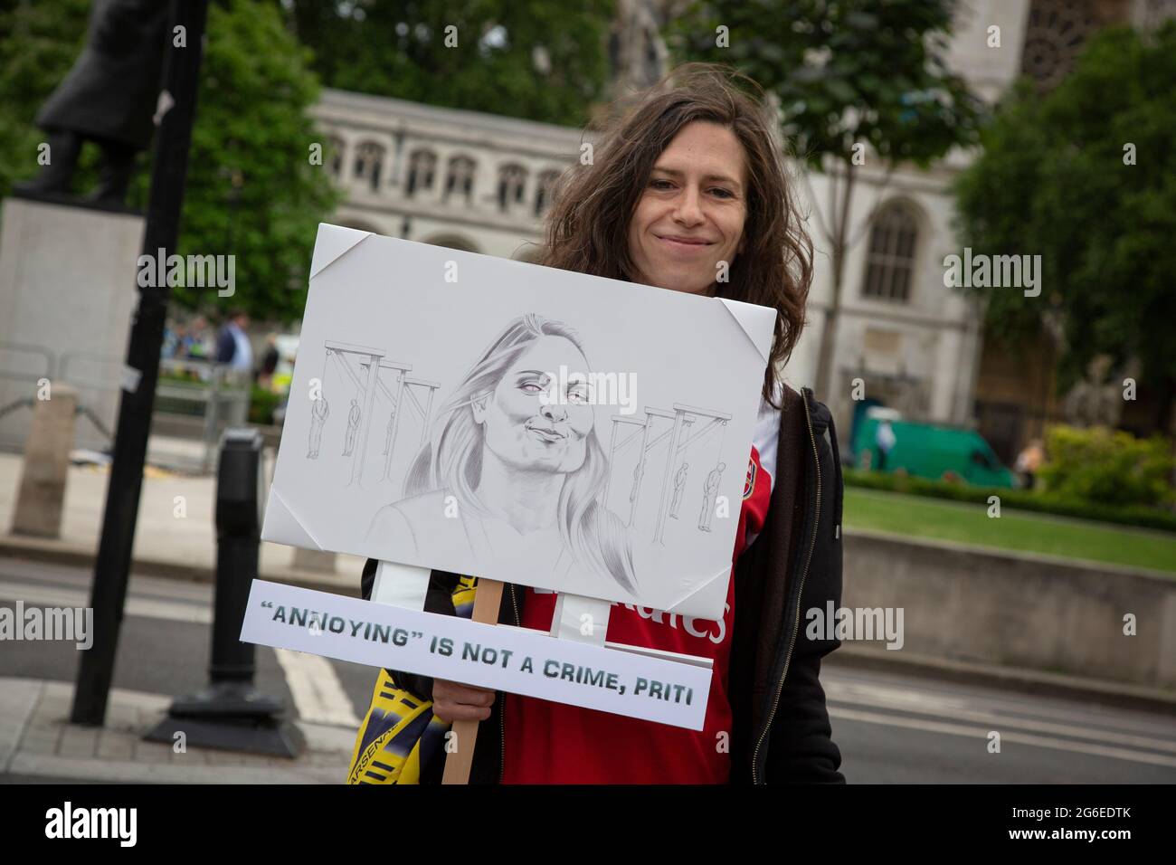 'Annoying' is not a crime, Priti. - A protester against Home Secretary Priti Patel from the group Sodem Action on Parliament Square. Stock Photo