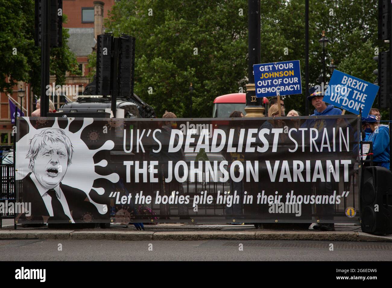 'UK's deadliest strain - the Johnson variant'  - Protesters from the group Sodem Action lead by Pro EU activist Steve Bray staging a protest on Whiteh Stock Photo