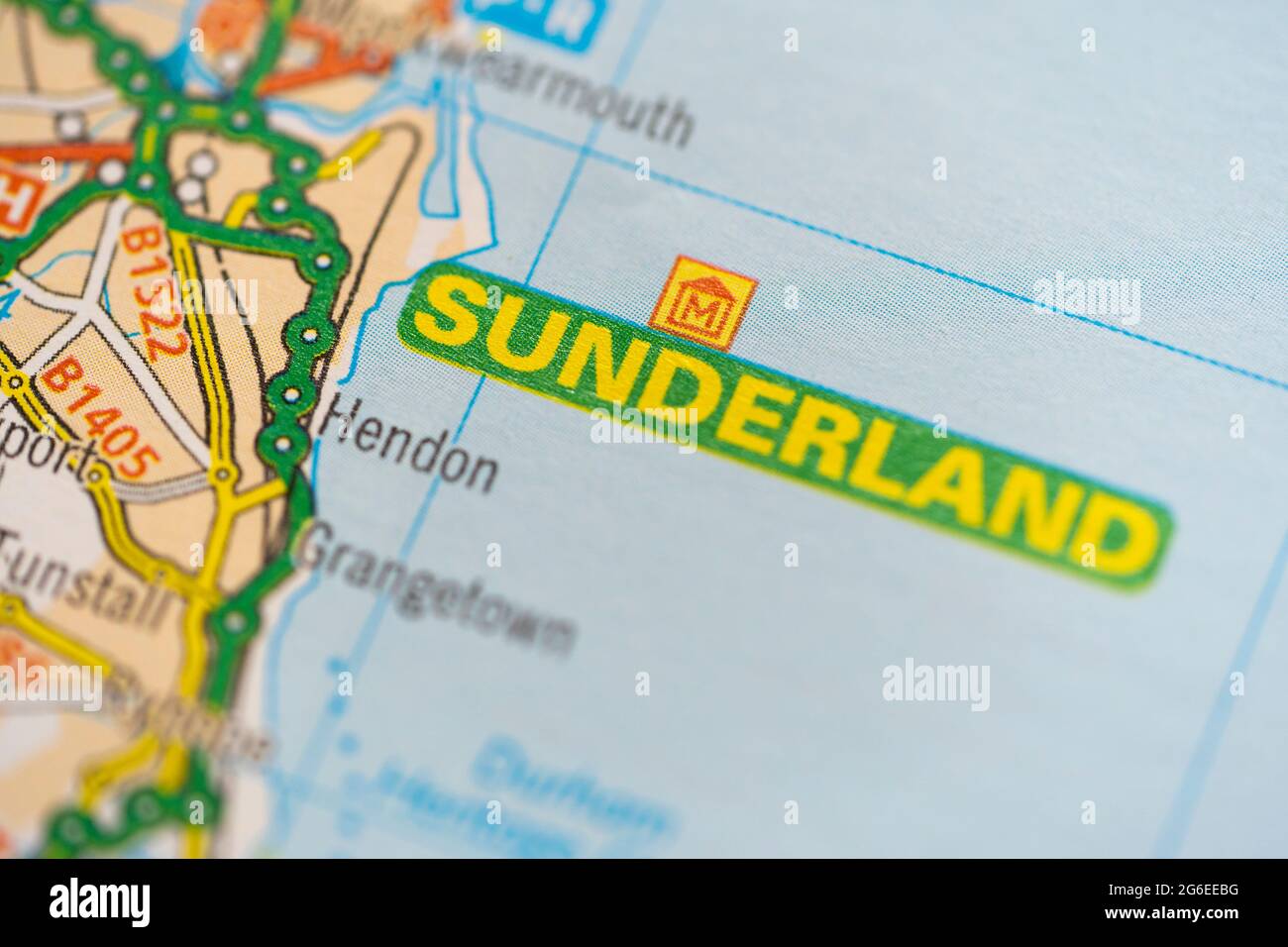A macro closeup of a page in a printed road map atlas showing the coastal city of Sunderland in England Stock Photo
