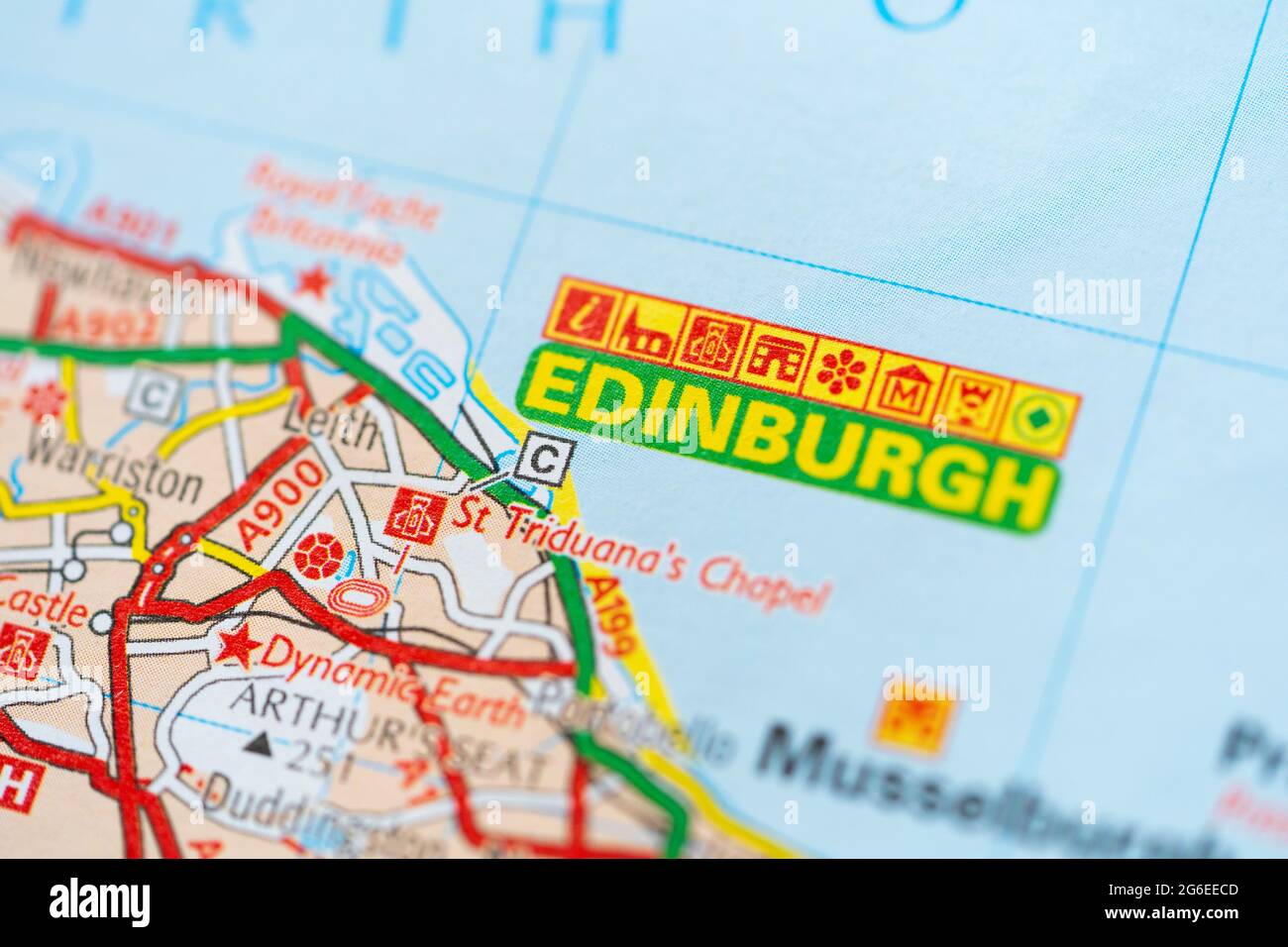 A macro closeup of a page in a printed road map atlas showing the capital city of Scotland - Edinburgh Stock Photo