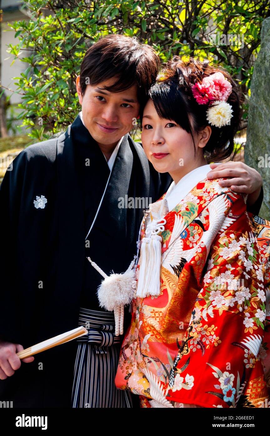 A Japanese bride and groom posing for engagement photos in Tokyo, Japan ...