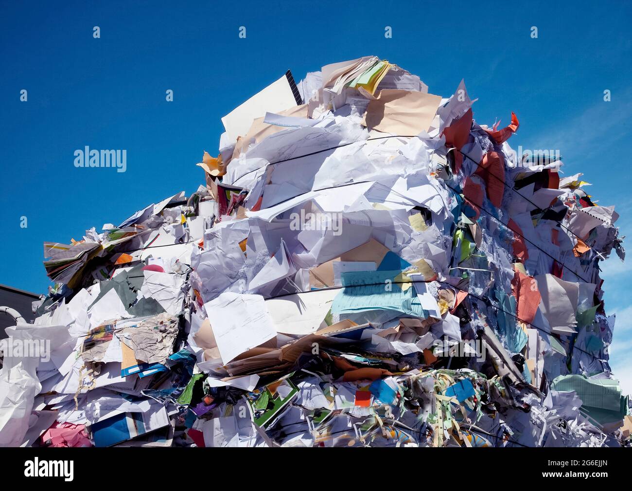 Compressed blocks of paper and cardboard ready for recycling in Canberra, Australia's national capital Stock Photo