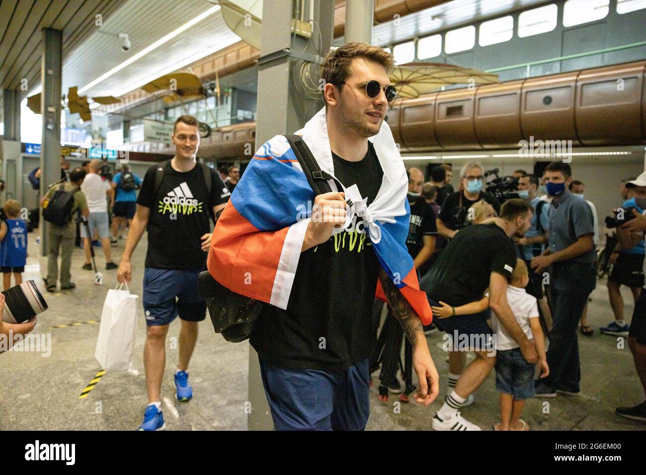 luka-doncic-walks-through-the-terminal-as-slovenian-basketball-team-arrives-at-the-ljubljana-airport-from-olympic-qualifying-tournament-in-kaunasslovenian-basketball-team-arrived-at-ljubljana-airport-on-monday-after-qualifying-for-the-summer-olympic-games-for-the-first-time-in-history-photo-by-luka-dakskobler-sopa-imagessipa-usa-2G6EM00.jpg