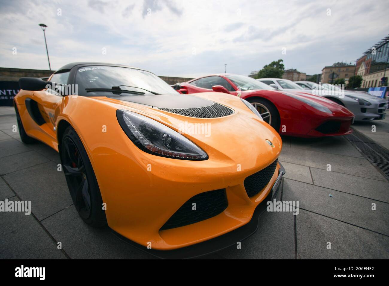Kracow, Poland. 02nd July, 2021. A yellow Lotus car is parked on the street during the Gran Turismo Polonia in Cracow.The biggest convention of supercars in Poland, Gran Turismo Polonia, took place in Cracow. Over 100 vehicles (e.g. Ferrari, Porsche, Lamborghini) were parked near the Sheraton Gran hotel during the 17th edition of the event. The value of the cars that took part in the convention was estimated at 120 000 000 PLN. (Photo by Vito Corleone/SOPA Images/Sipa USA) Credit: Sipa USA/Alamy Live News Stock Photo