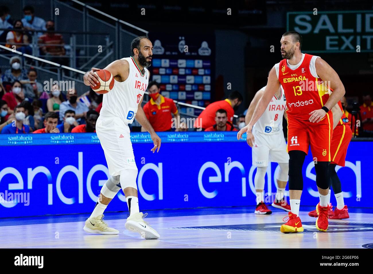 Madrid, Spain. 05th July, 2021. Hamed Haddadi (L) of Iran seen and Marc  Gasol (R) of Spain seen in action during Spain vs Iran friendly match of  basketball at Wiznink Center in