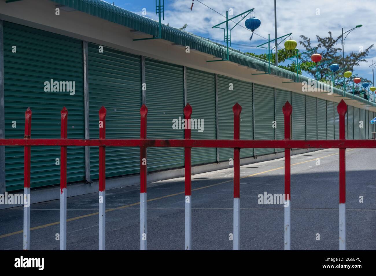 Metal barrier grid prohibit access to the street. Closed city area. Vietnam, Nha Trang. Stock Photo
