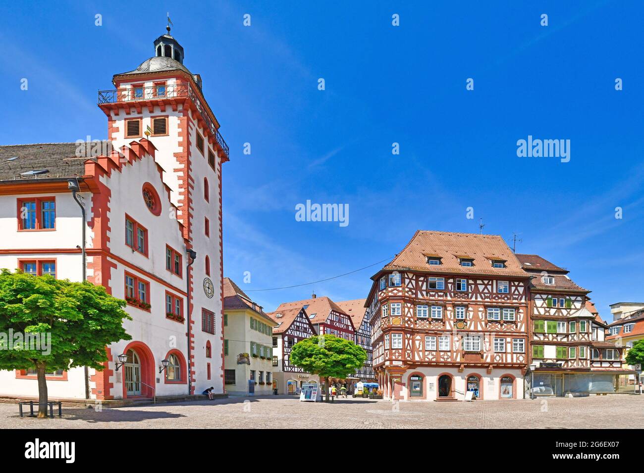 Mosbach, Germany - June 2021: Old city hall and half timbered buildings at historic city center on sunny day Stock Photo
