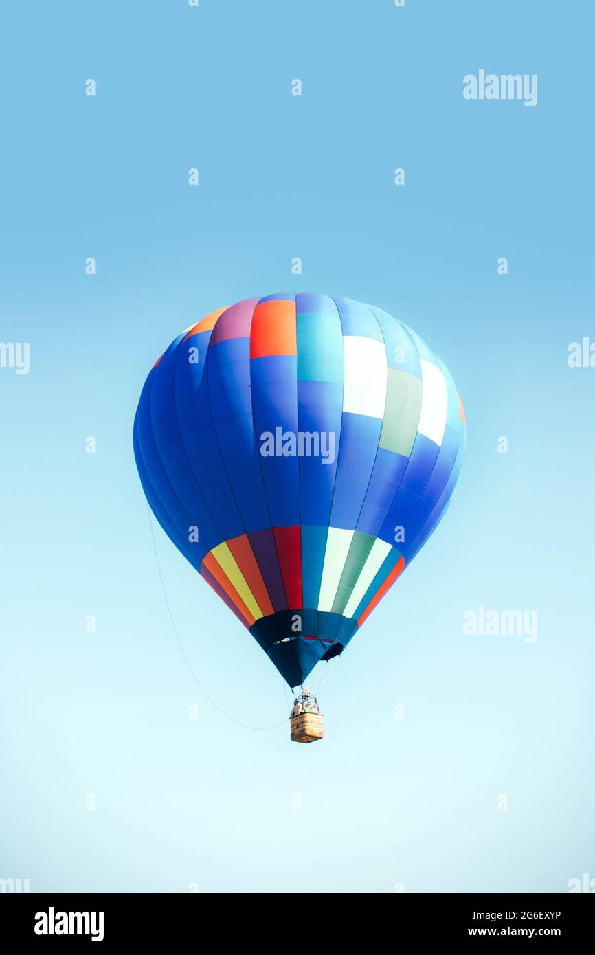 Striped hot air balloon in the sky Stock Photo - Alamy