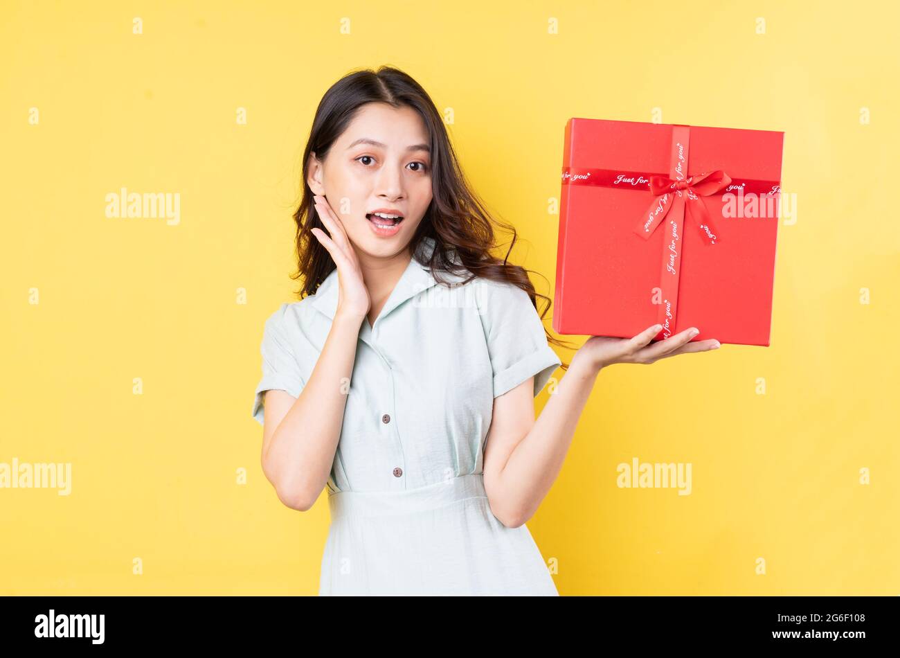 portrait of asian woman holding gift box Stock Photo
