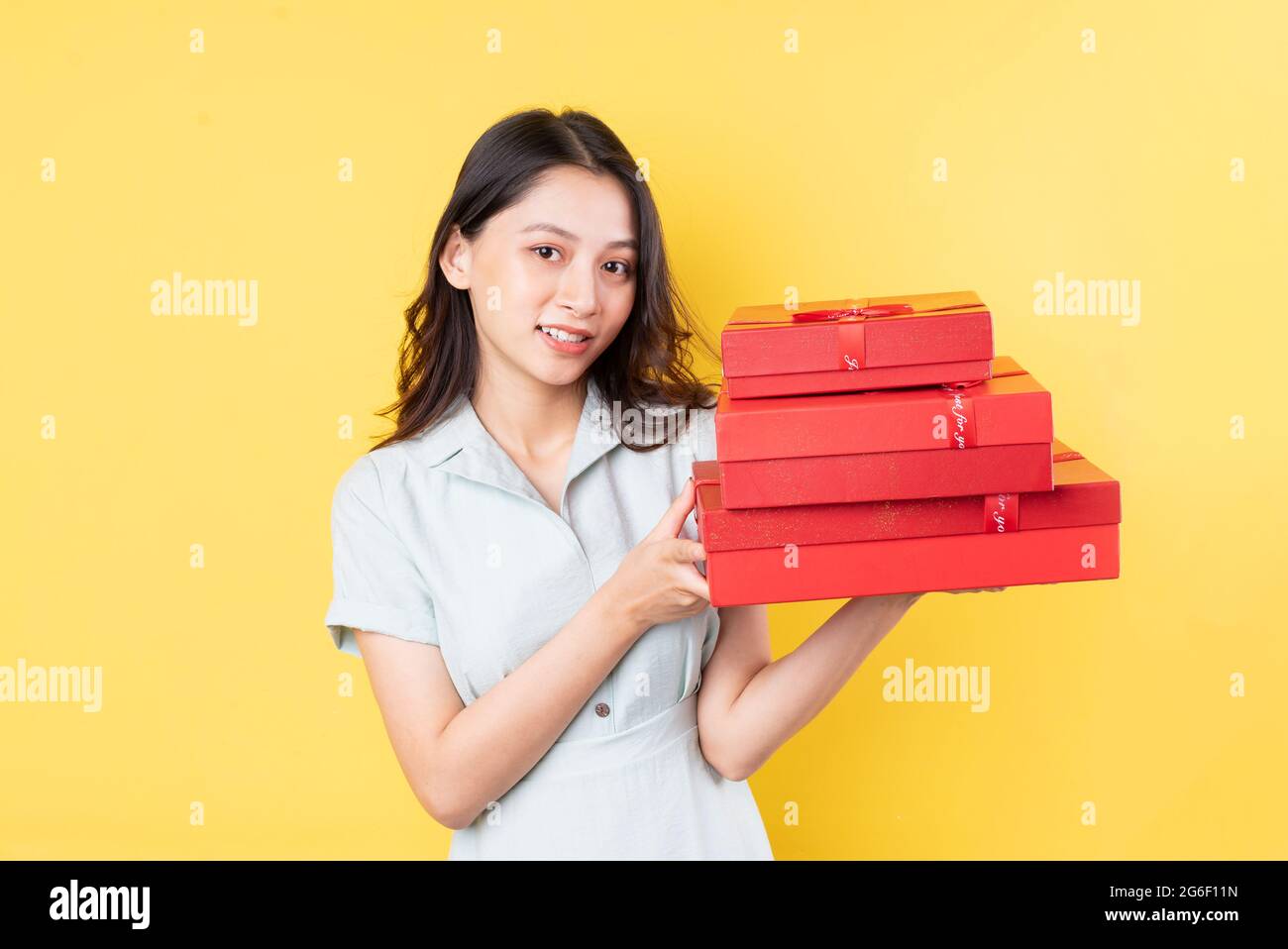 portrait of asian woman holding gift box Stock Photo