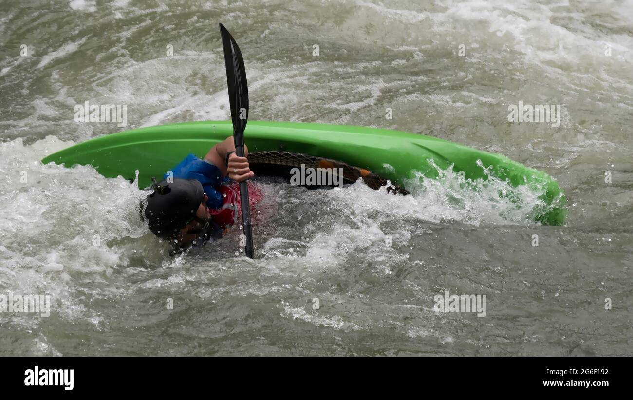 Kayaker in foaming water Stock Photo