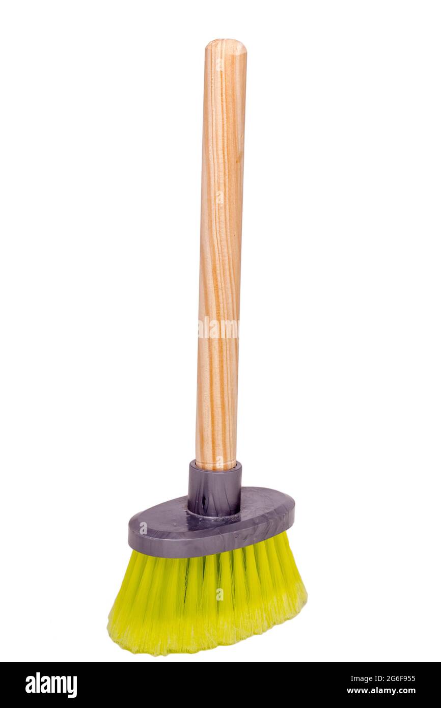 Close up view of a small dust brush with wood handle isolated on a white background. Stock Photo