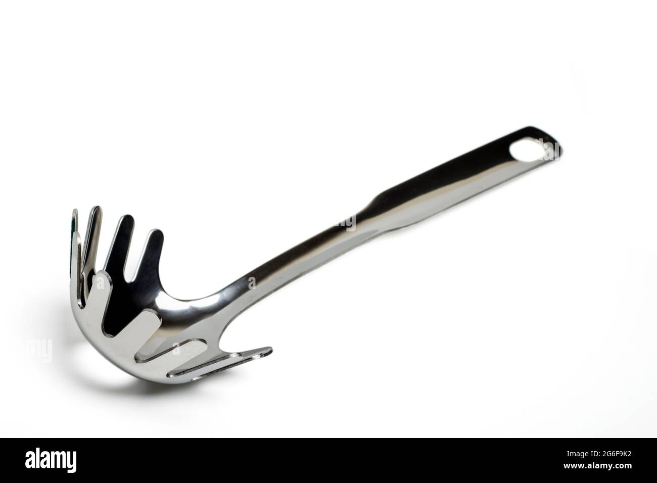 Close up view of a spaghetti fork isolated on a white background Stock
