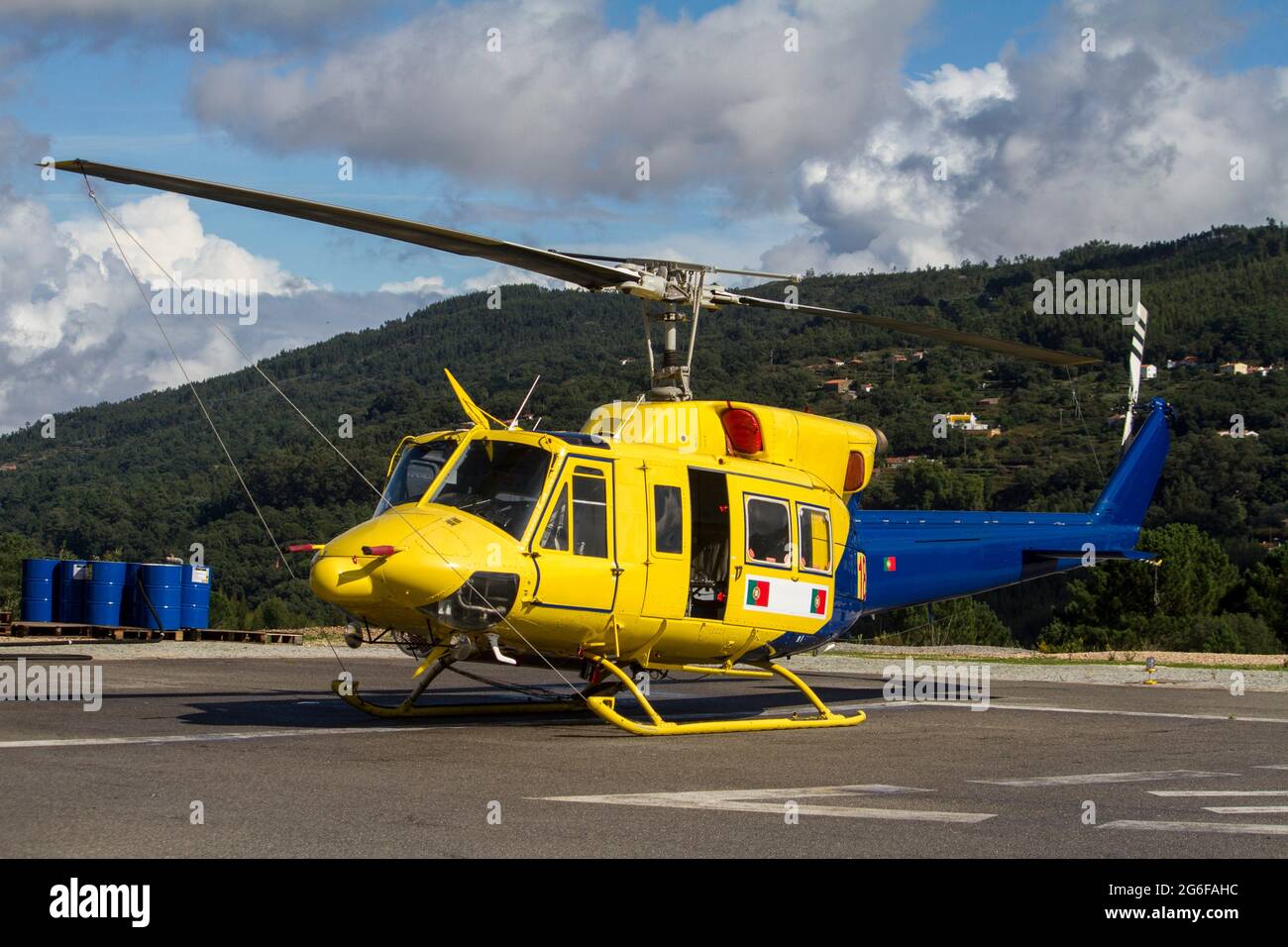 Blue and yellow helicopter hi-res stock photography and images - Alamy