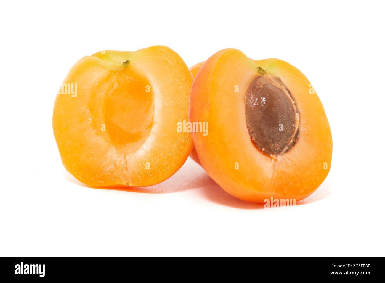 View of tasty Armenian plums (Prunus armeniaca) over a white wooden