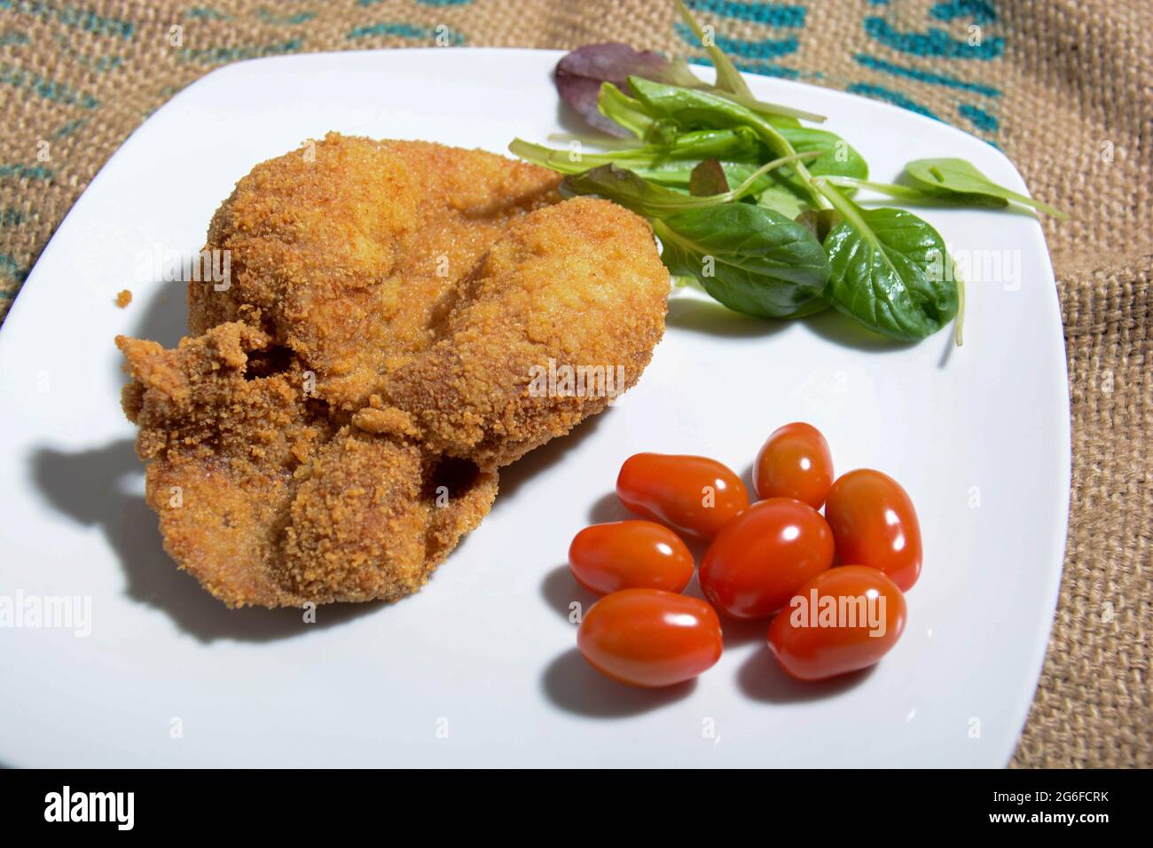 real Italian veal cutlet with crispy breading Stock Photo Alamy
