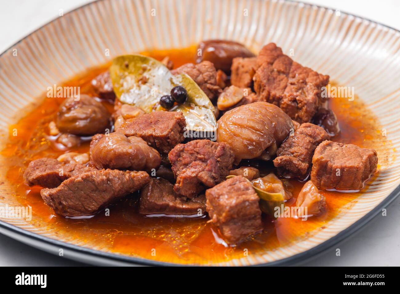 beef stew with onion and spices Stock Photo - Alamy