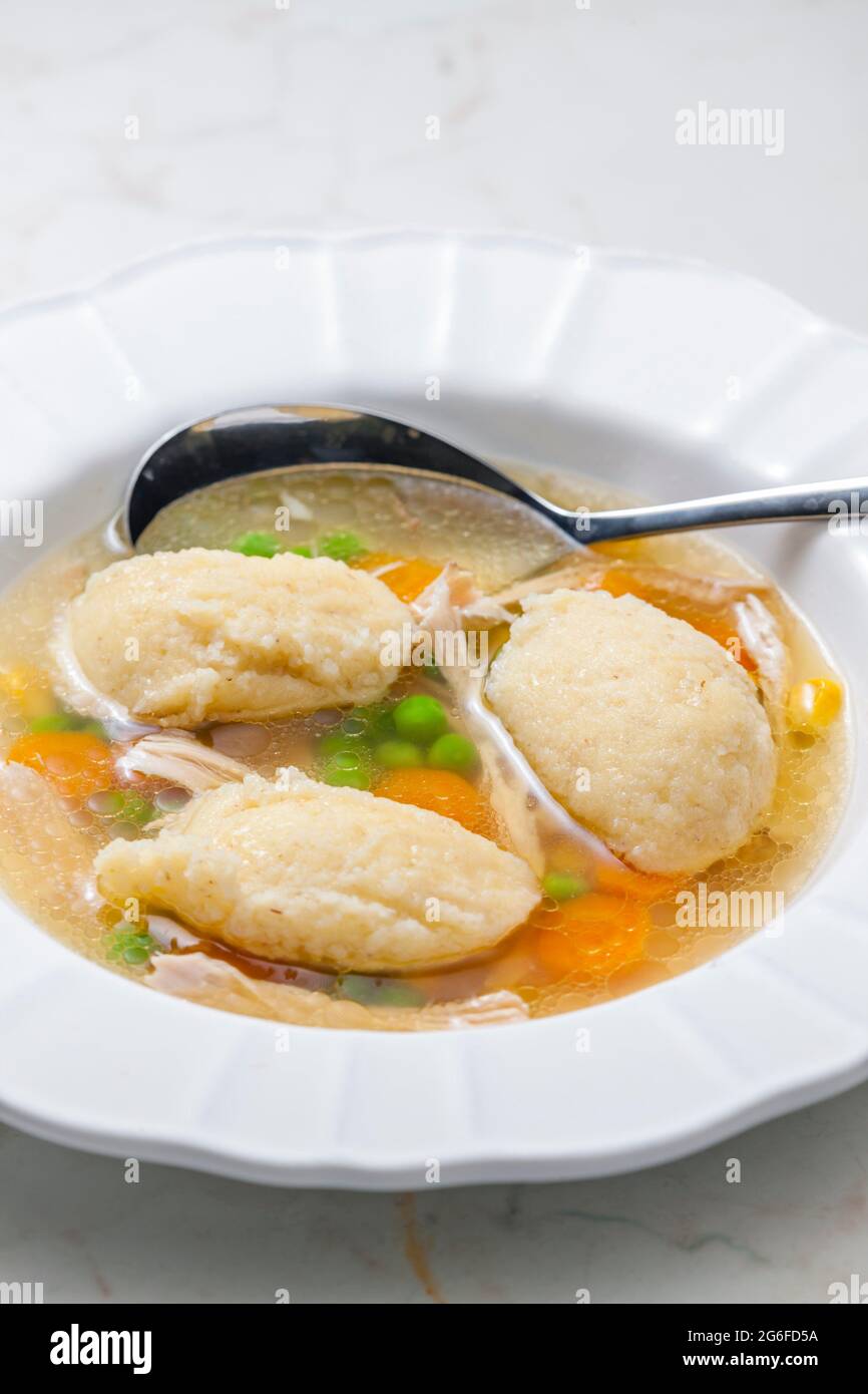 chicken broth with semolina dumplings and vegetables Stock Photo Alamy