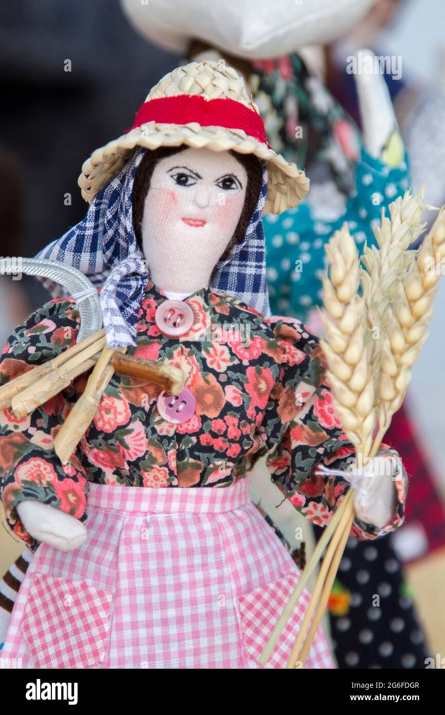 Close up view of beautiful handmade crafted folk dolls of Portuguese culture. Stock Photo