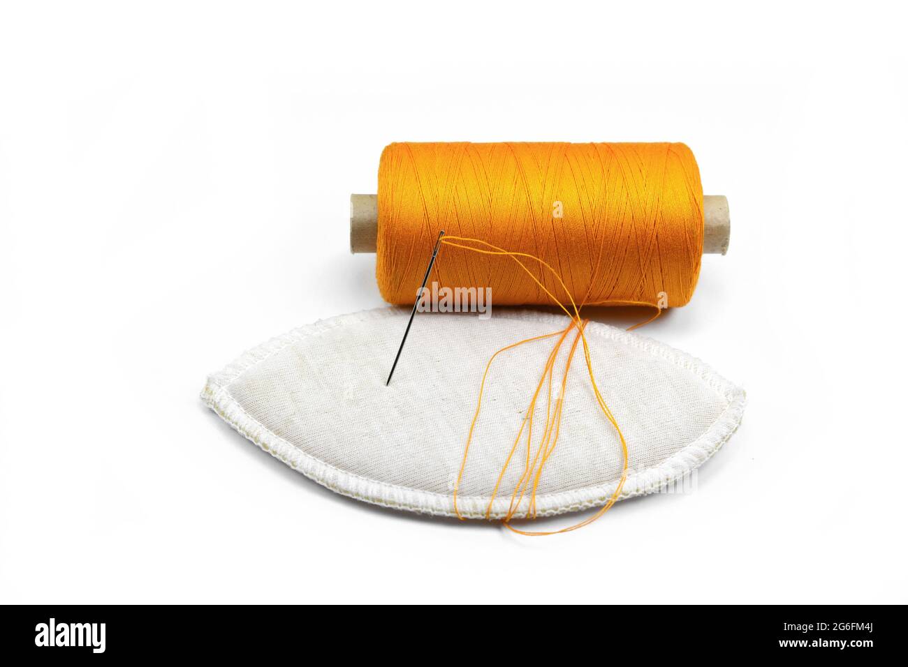 Color sewing threads isolated on white background Stock Photo - Alamy