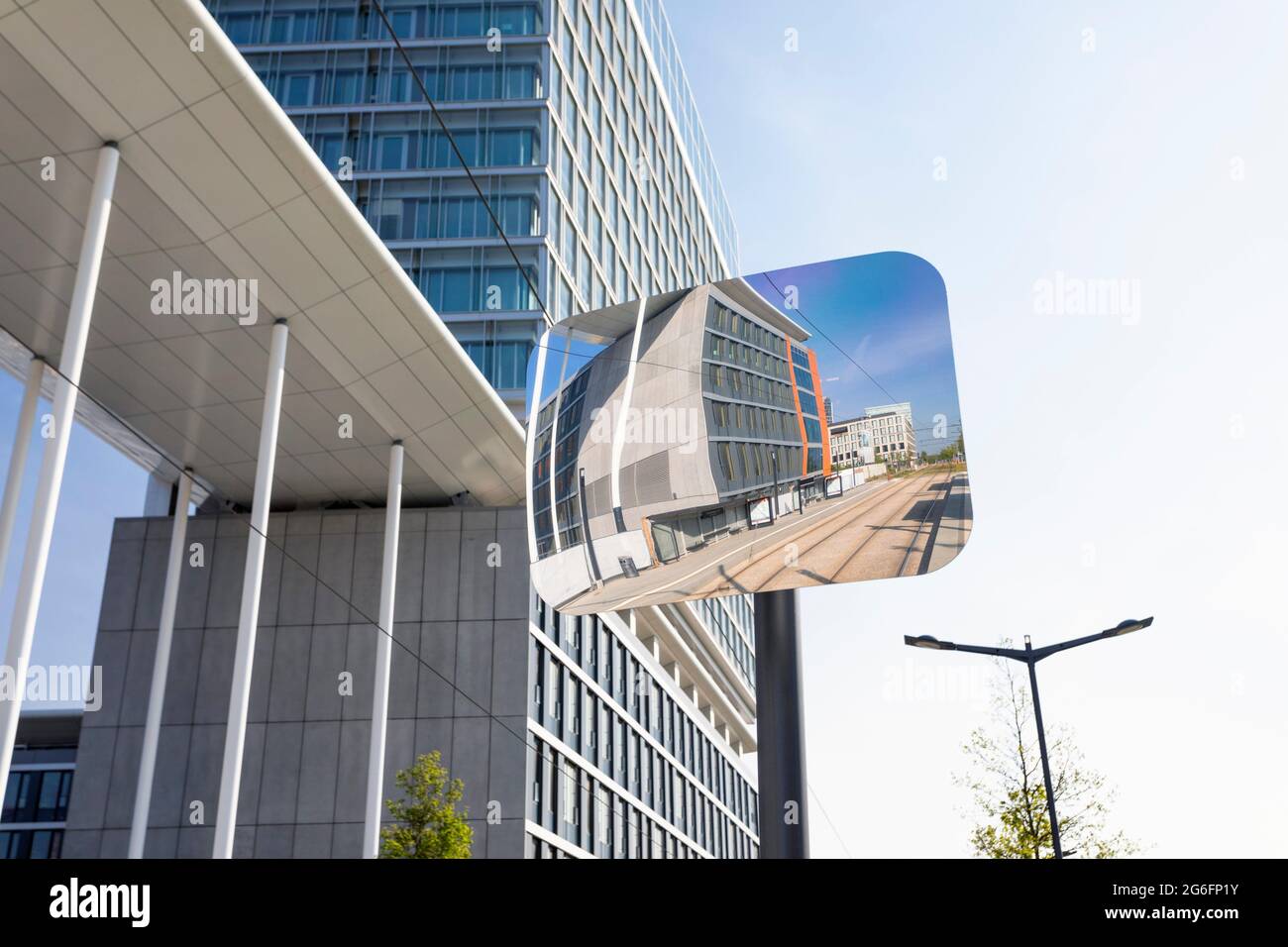 Europe, Luxembourg, Luxembourg City, Kirchberg, Europaparlament Building (Parlement Européen) reflected in Tram Stop Mirror. Stock Photo