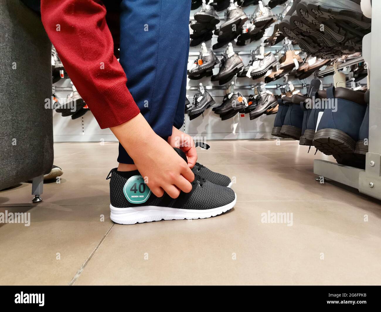 Buying shoes hires stock photography and images Alamy