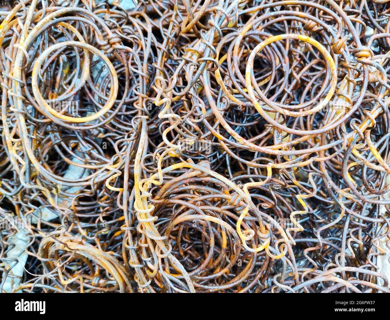 Moldy wires. Scrap iron. Stock Photo