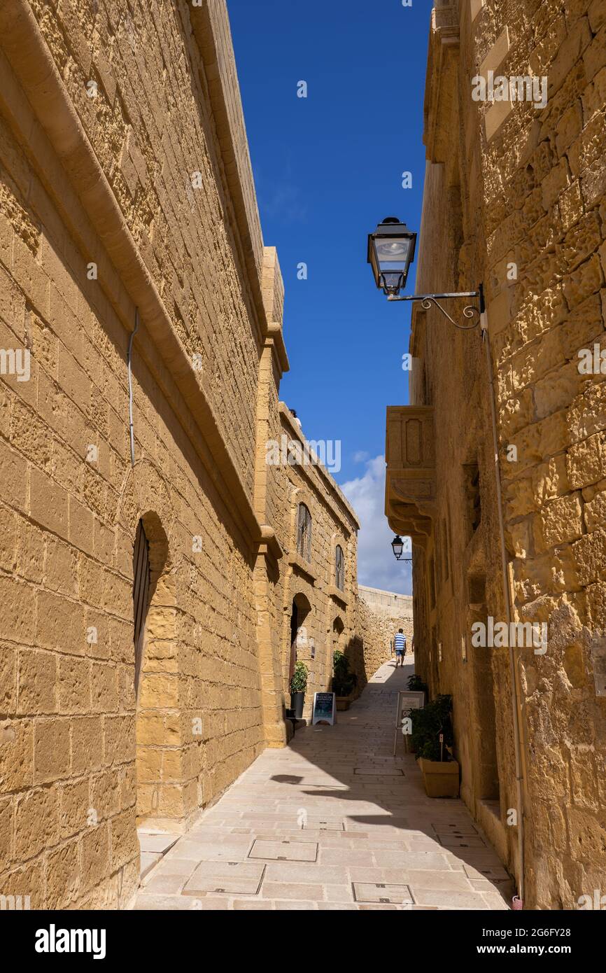 Victoria Rabat Streets Narrow street and stone walls in the Cittadella, Citadel in old city of ...