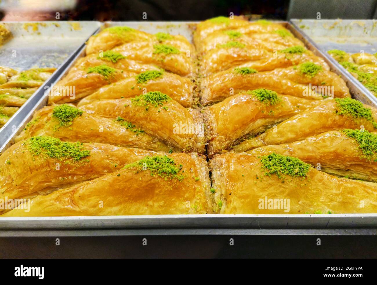 Baklava with pine nuts. Turkish dessert baklava. Sale of sweets at the