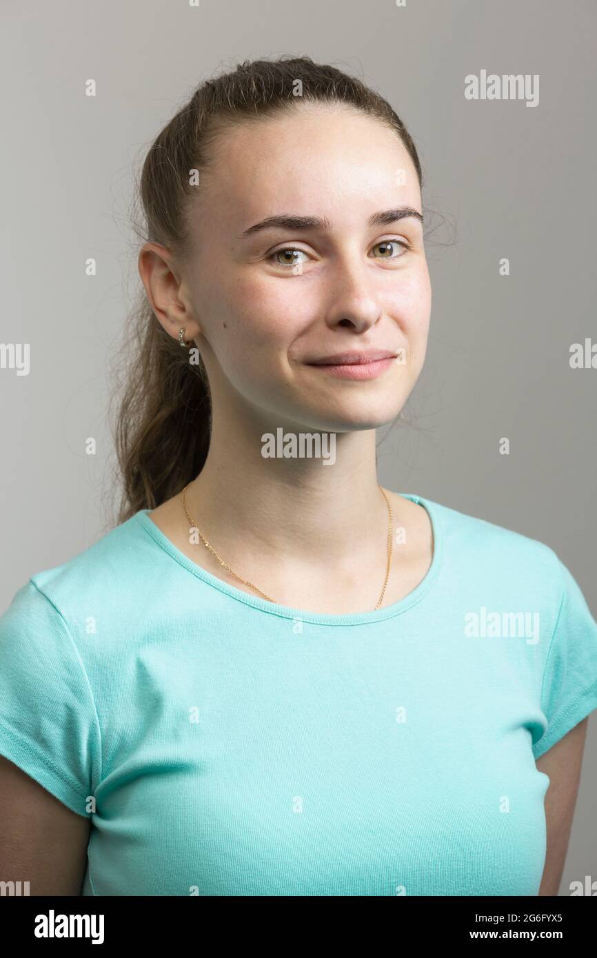 Studio portrait confident young woman Stock Photo