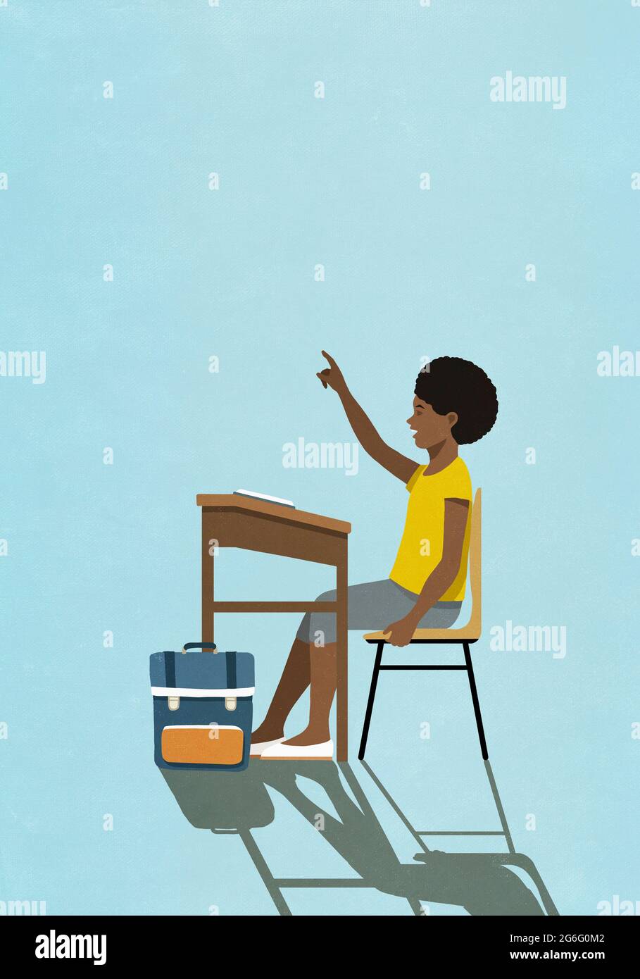 Schoolgirl raising hand at classroom desk Stock Photo - Alamy