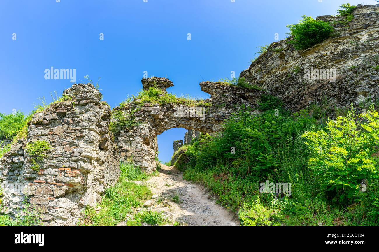 KHUST, UKRAINE - June 24, 2021: Ruins of Khust castle which was built as a fortress to protect the salt road from Solotvyno in Khust, Ukraine Stock Photo