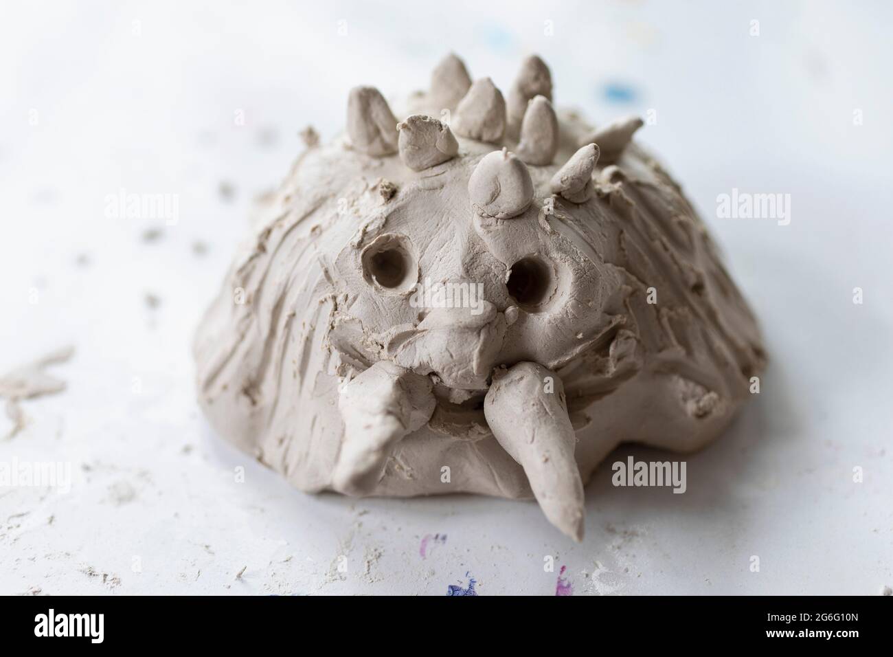 Close up cute monster molded in clay Stock Photo