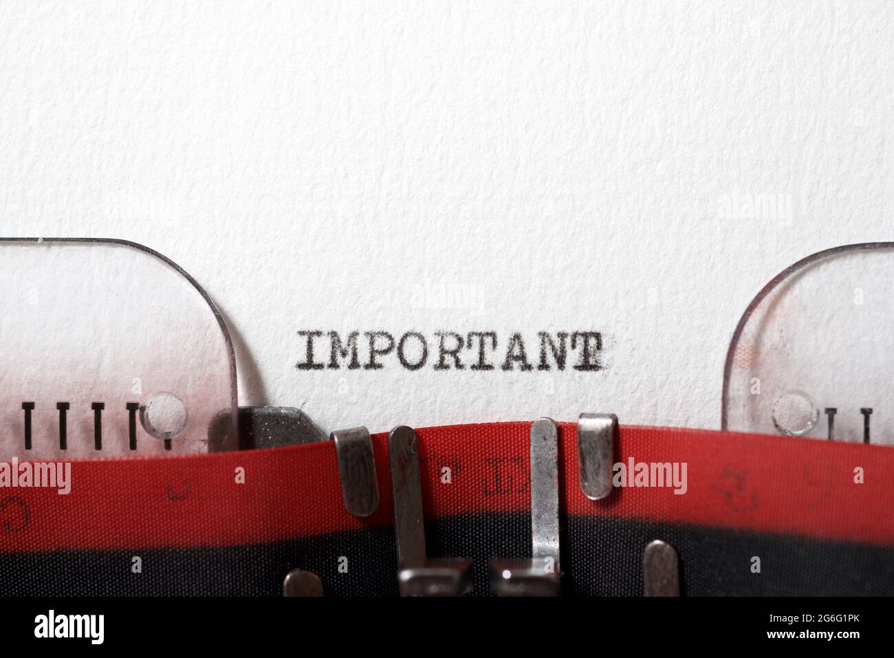 The word important written with a typewriter Stock Photo Alamy