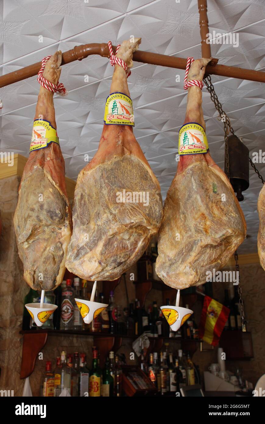 Cured ham hanging in restaurant hi-res stock photography and images - Alamy