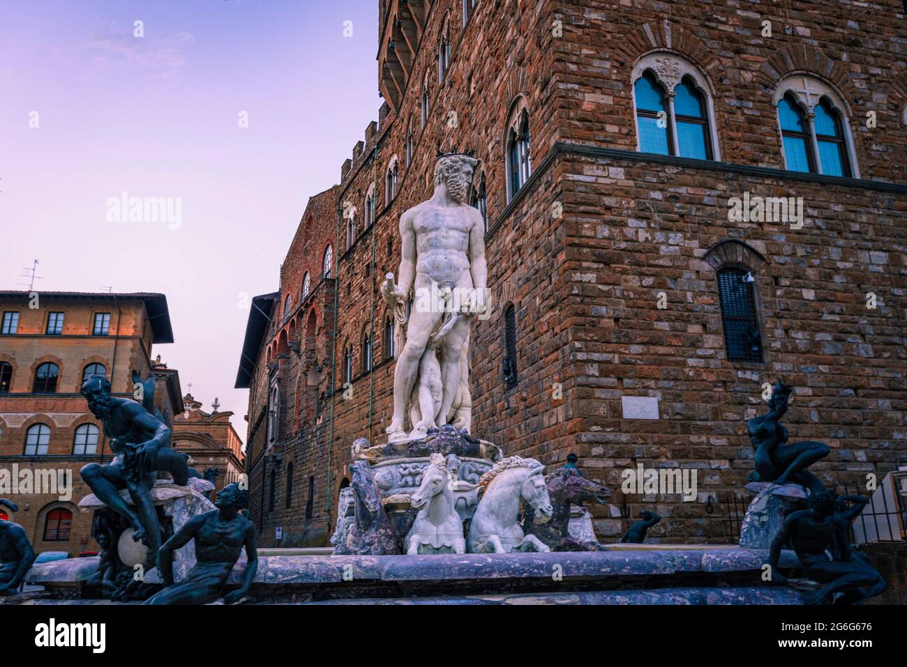 Renaissance sculpture of Neptune. Michelangelo, Fountain of Neptune by Bartolomeo Ammannati at Palazzo Vecchio. Florence, Italy. Stock Photo