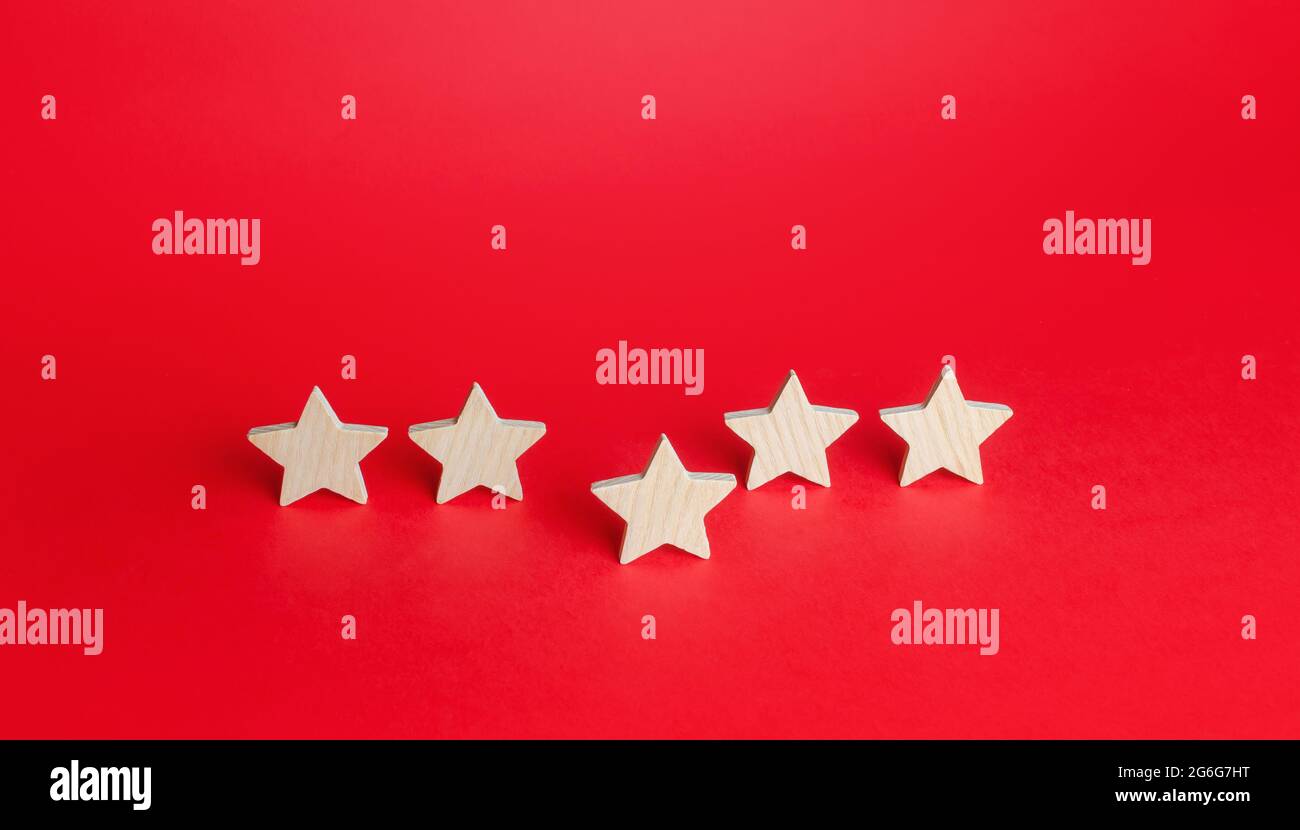 One of five stars comes out ahead. Best of the best. Rating evaluation concept. Service quality feedback. High satisfaction. Good reputation. Populari Stock Photo