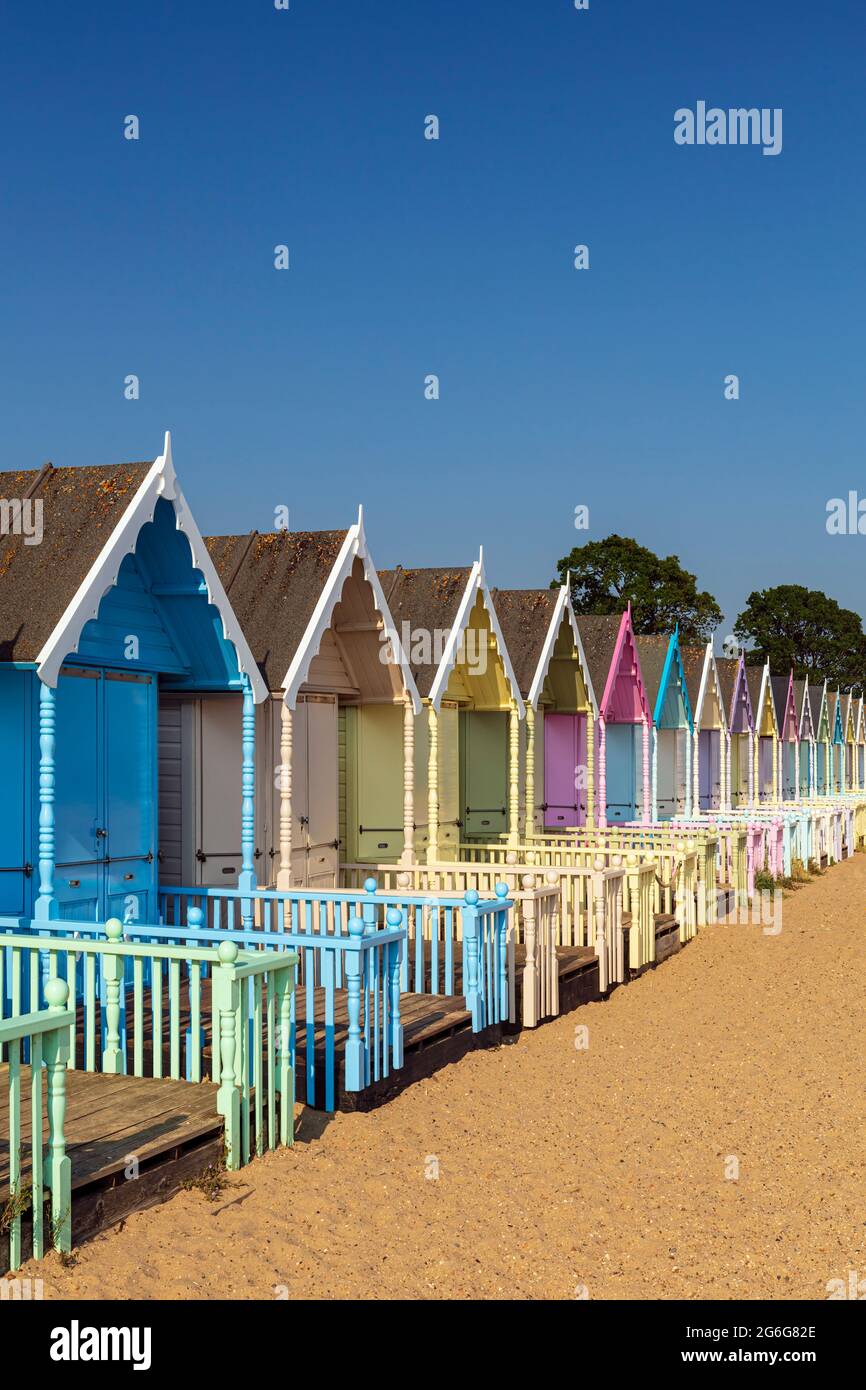 Pastel coloured beach huts. Stock Photo