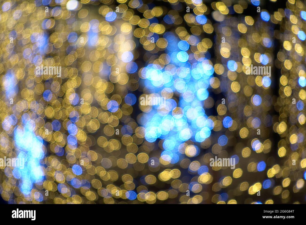 Abstract Blurred Christmas Lights gold Bokeh Background Stock Photo - Alamy