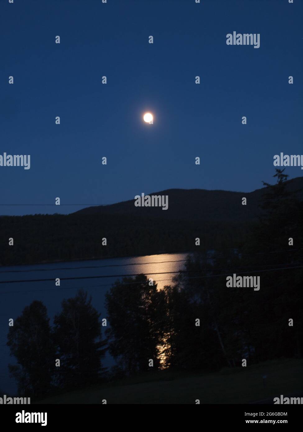 Indian Lake, New York in Adirondack State Park with moon rise and views
