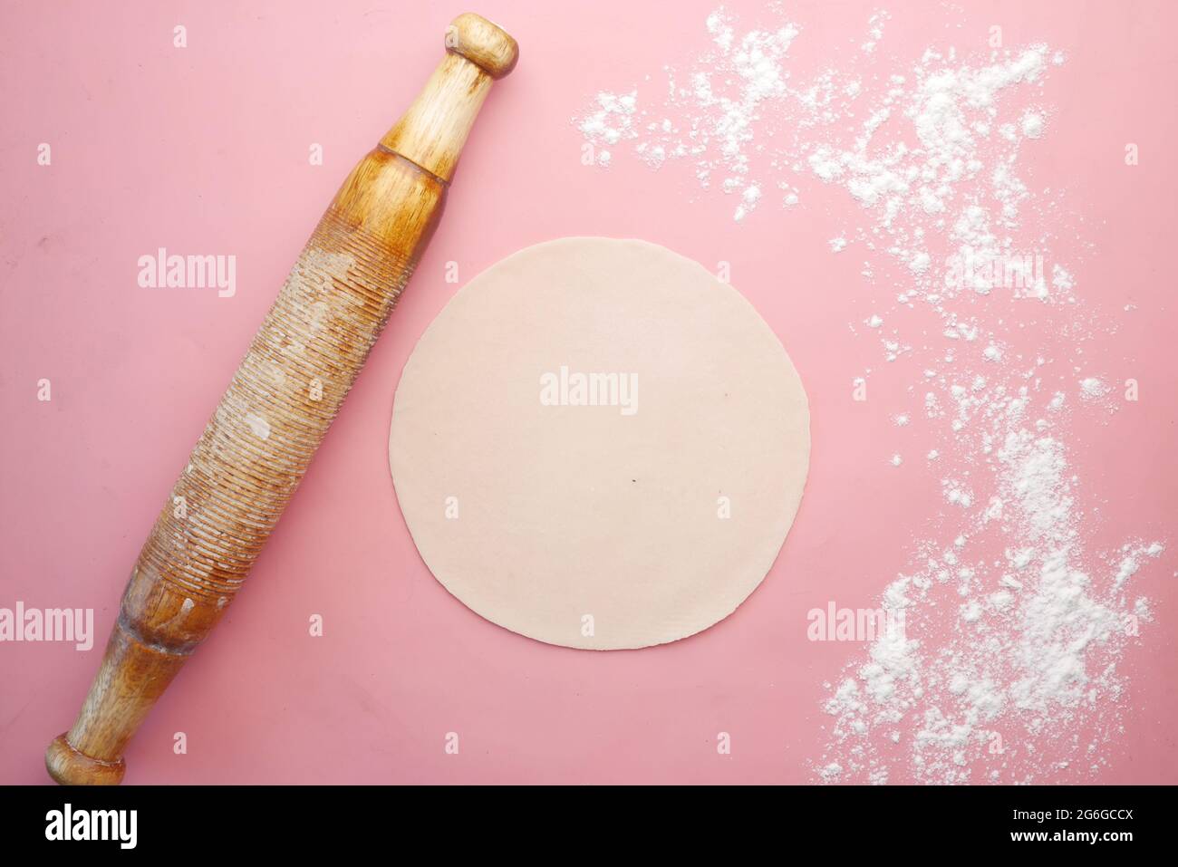 baking dough with rolling pin on table, top view Stock Photo Alamy