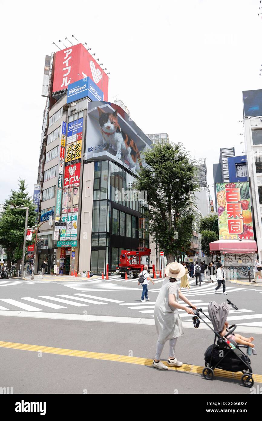 Tokyo, Japan. 6th July, 2021. A digital billboard displays a big 3D