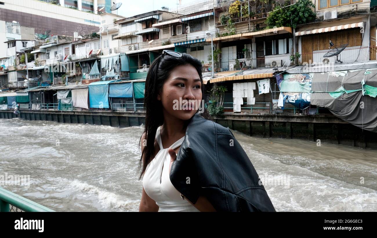 Tourist Chinese Asian Model Poser Actress wearing Black Leather Jacket White Blouse Sightseeing  Bangkok Thailand Stock Photo