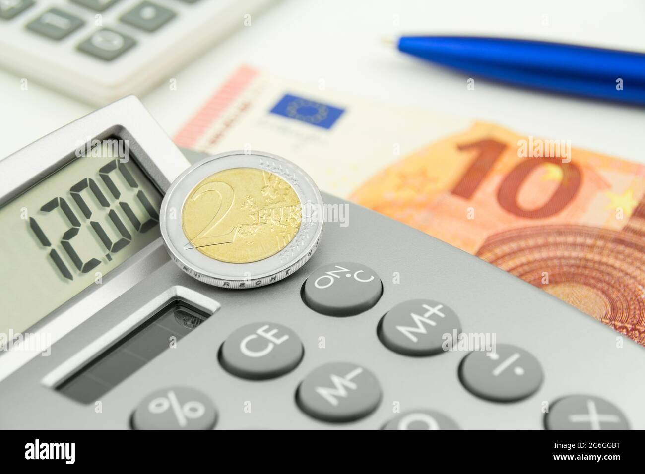 12,00  Euro and calculator closeup Stock Photo