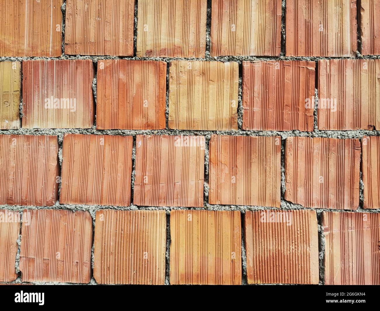 Red bricks. Brick wall. Garden wall. Stock Photo