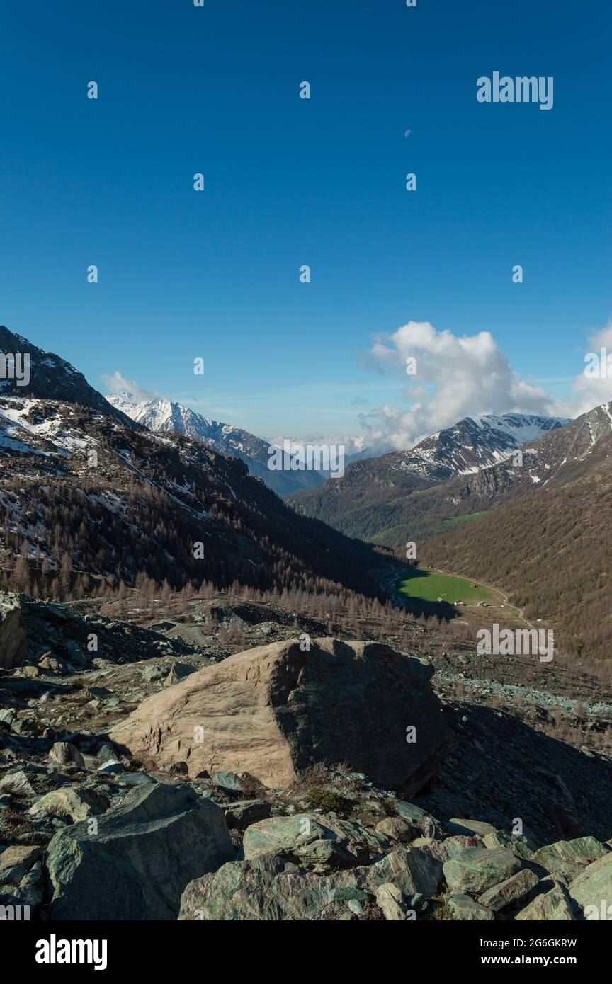 The Ayas valley and the Piani di Verra inferiori seen from the high point of view of the blu lake on the Mount Rose in northern Italy near Aosta Stock Photo