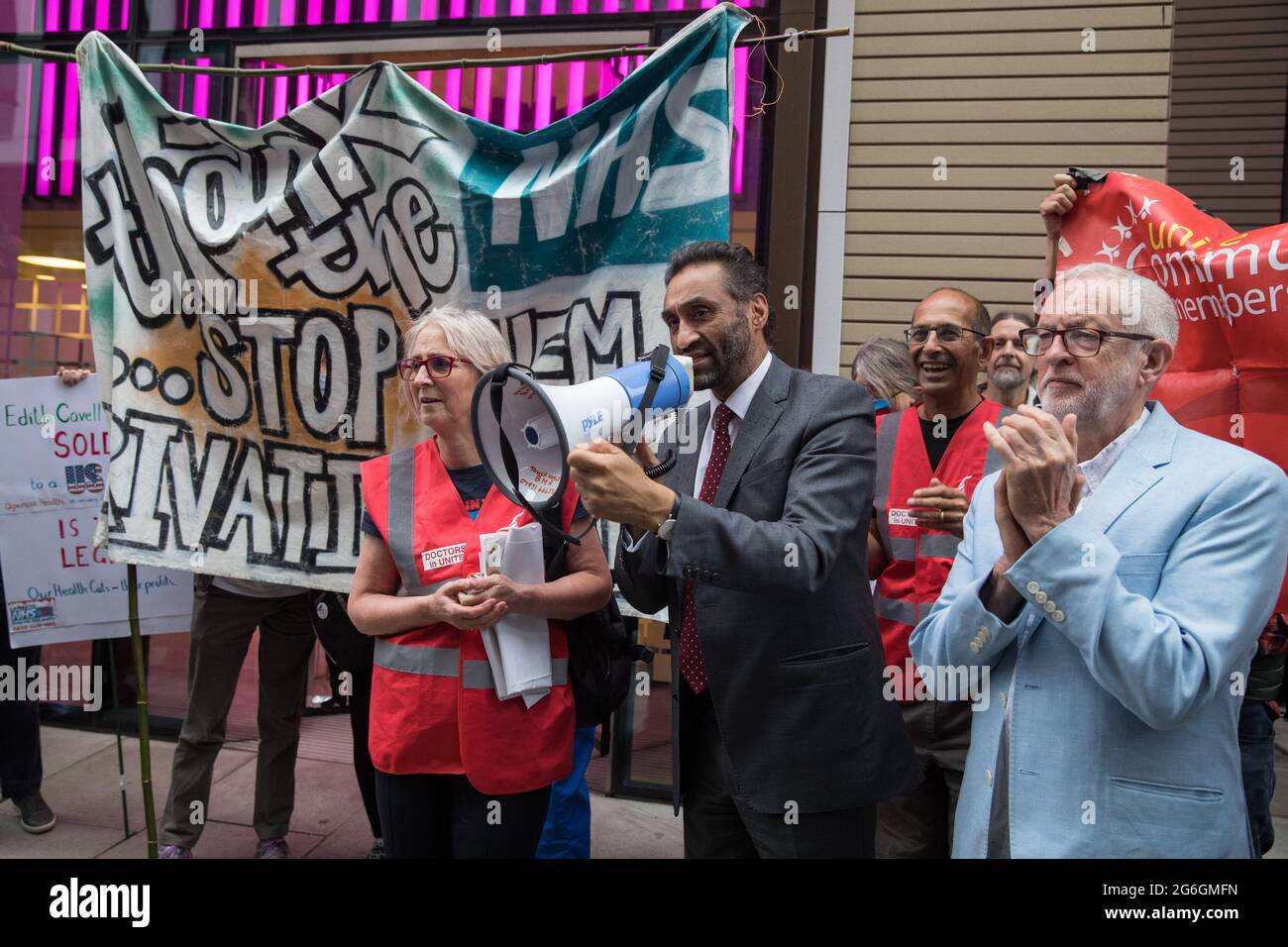 London, UK. 5th July, 2021. Dr Onkar Sahota addresses health workers and supporters at a rally organised by Doctors in Unite outside the Department of Health and Social Care. The rally was organised to mark the 73rd birthday of the National Health Service and in protest against the sale of one of the UK’s biggest GP practice operators to the US health insurance group Centene Corporation. Credit: Mark Kerrison/Alamy Live News Stock Photo