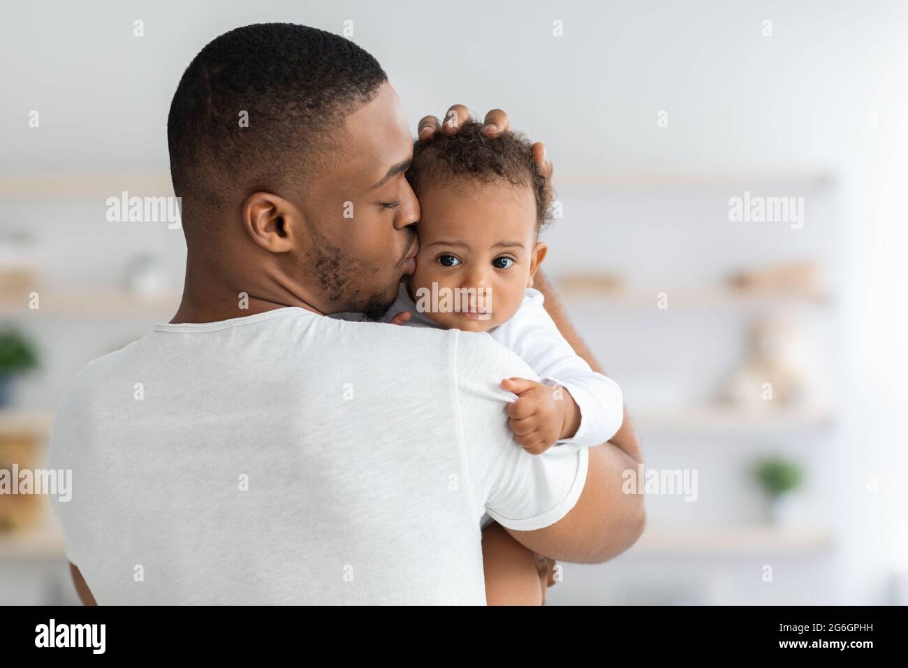 Love kiss baby hug cuddle hi-res stock photography and images - Alamy