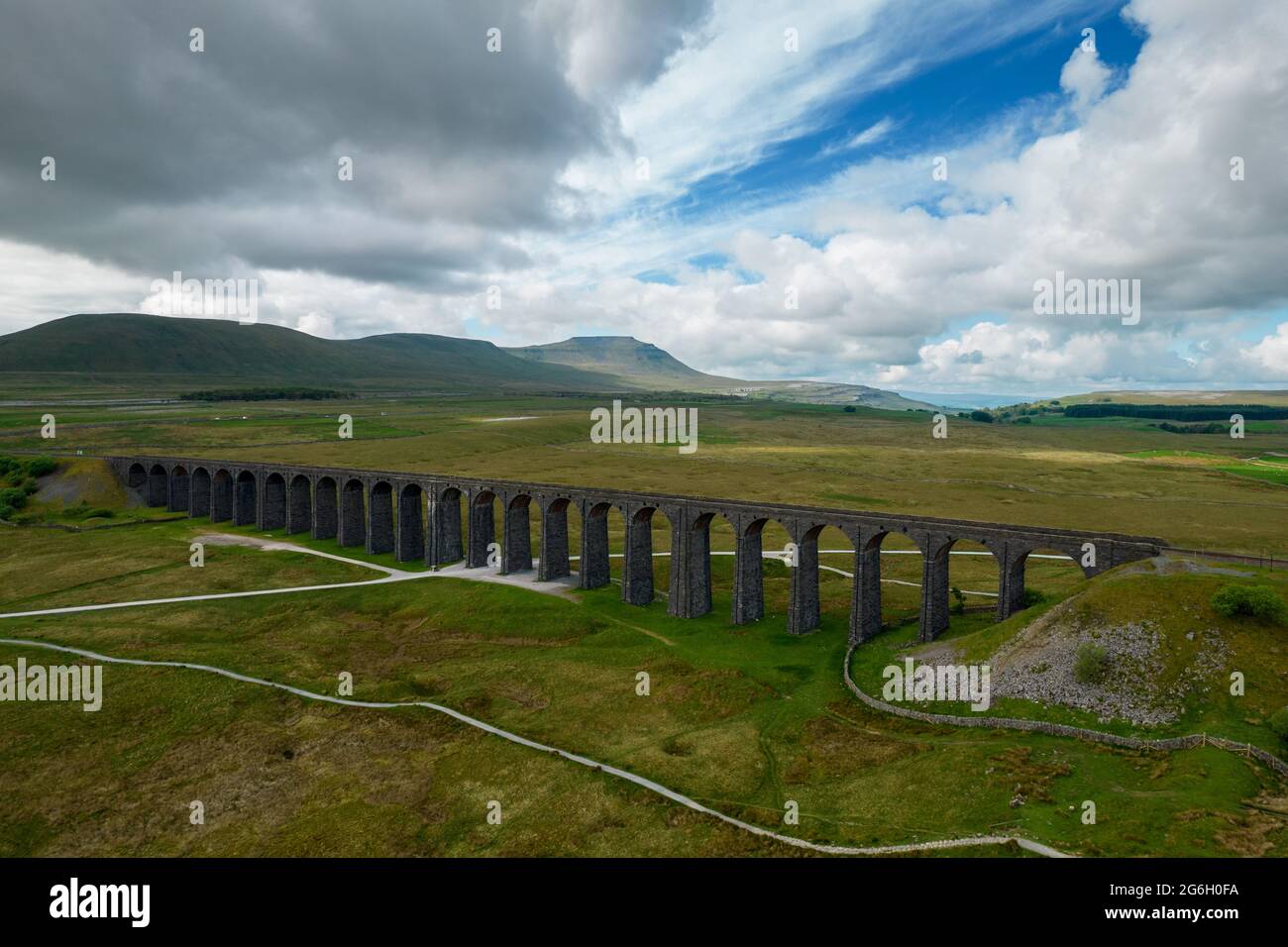 The Ribblehead viaduct in Yorkshire at the bottom of the Whernside summit Stock Photo